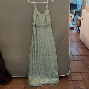 Full length, sea green beaded dress. Size 6.